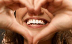 What are some harmful foods to avoid for a healthy smile?